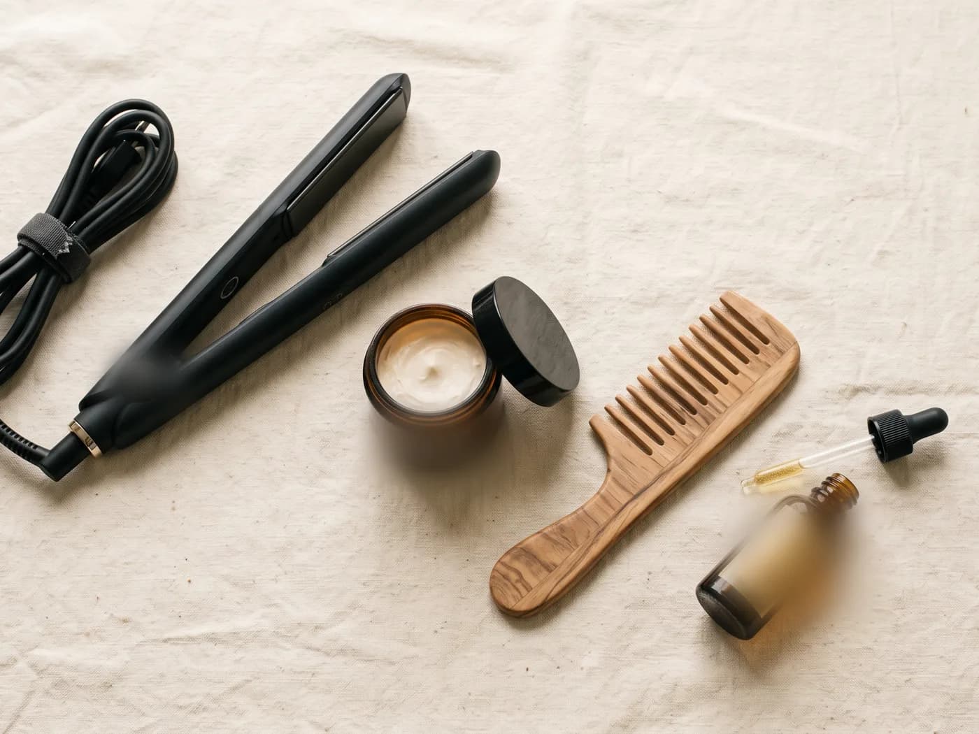 Professional hair styling tools and products laid out
